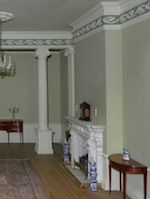 Ann Barrington has picked out the details of the mouldings to enhance the elegant hallway